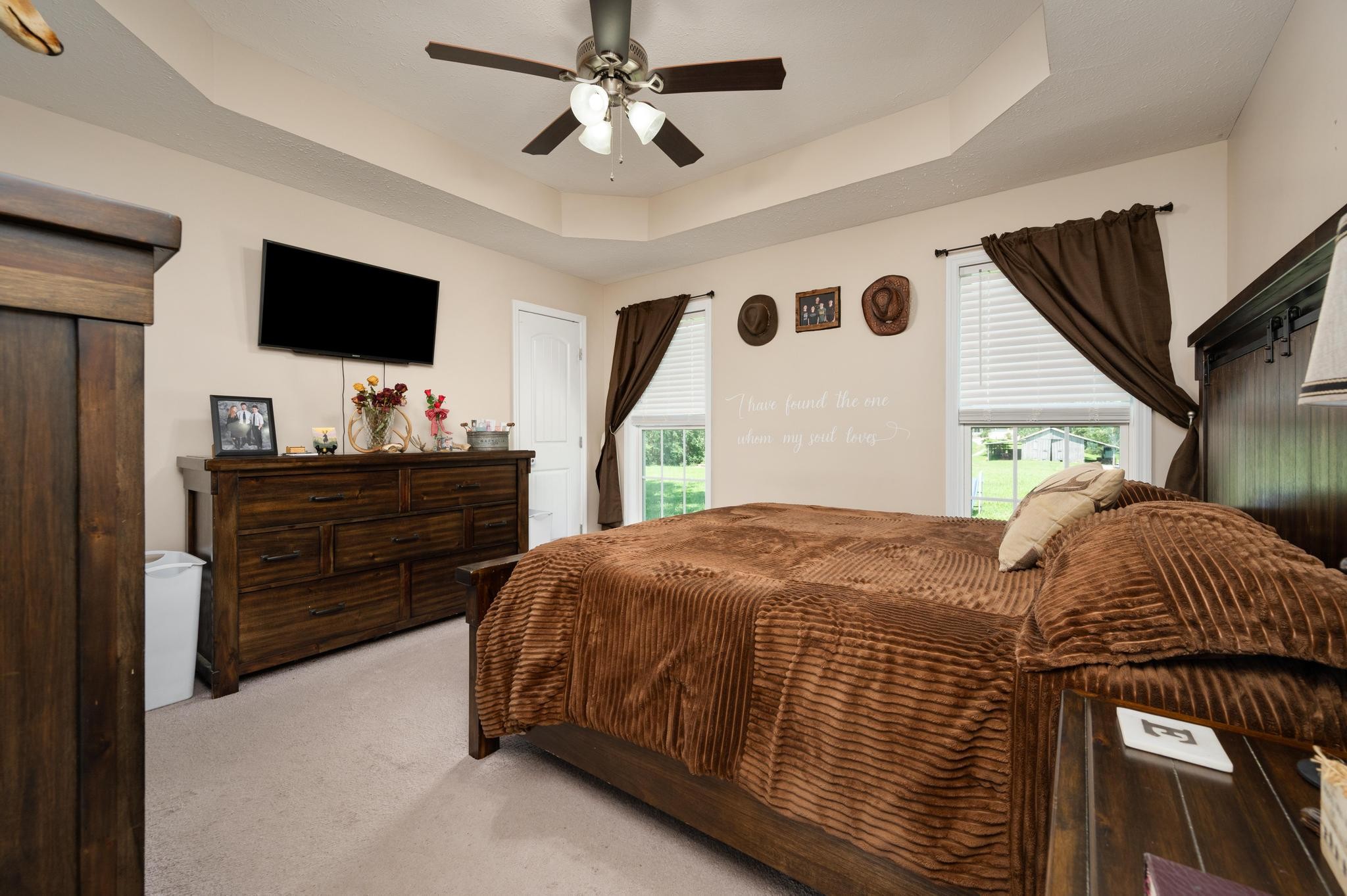 7040 Charity Road Petersburg, TN 37144 - Photo 17 of 36 a bedroom with a bed and a flat screen tv