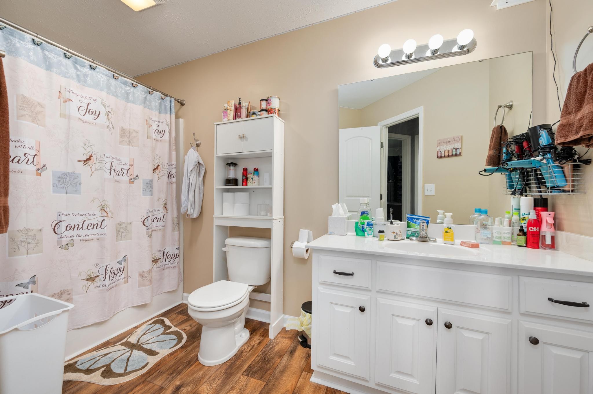 7040 Charity Road Petersburg, TN 37144 - Photo 21 of 36 a bathroom with a sink vanity mirror and toilet