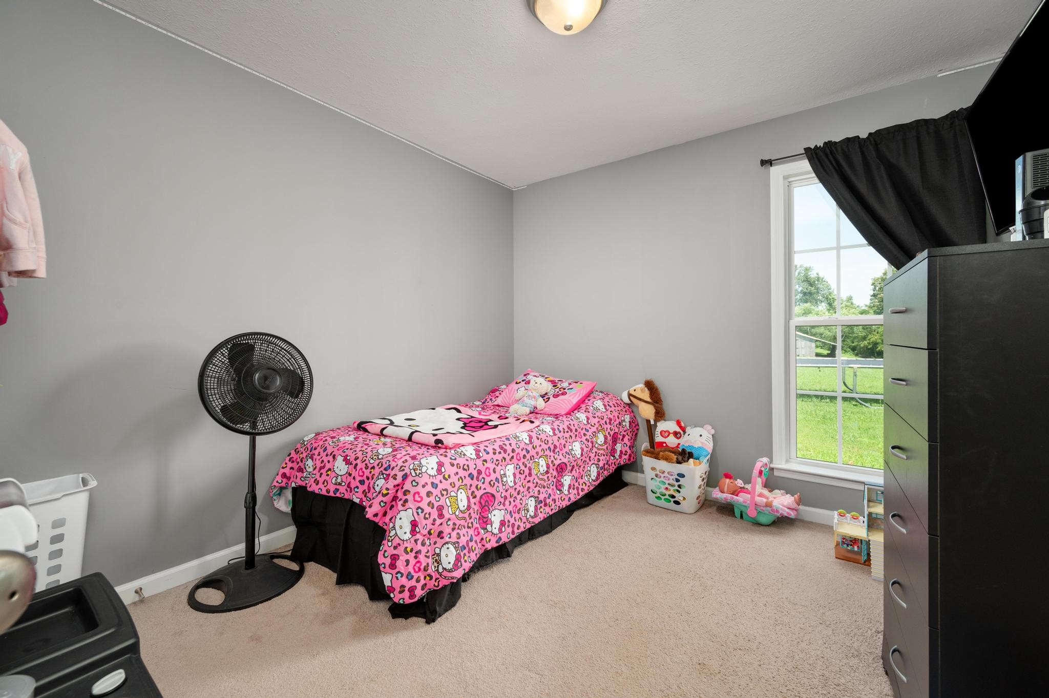 7040 Charity Road Petersburg, TN 37144 - Photo 22 of 36 a bedroom with a bed and a window