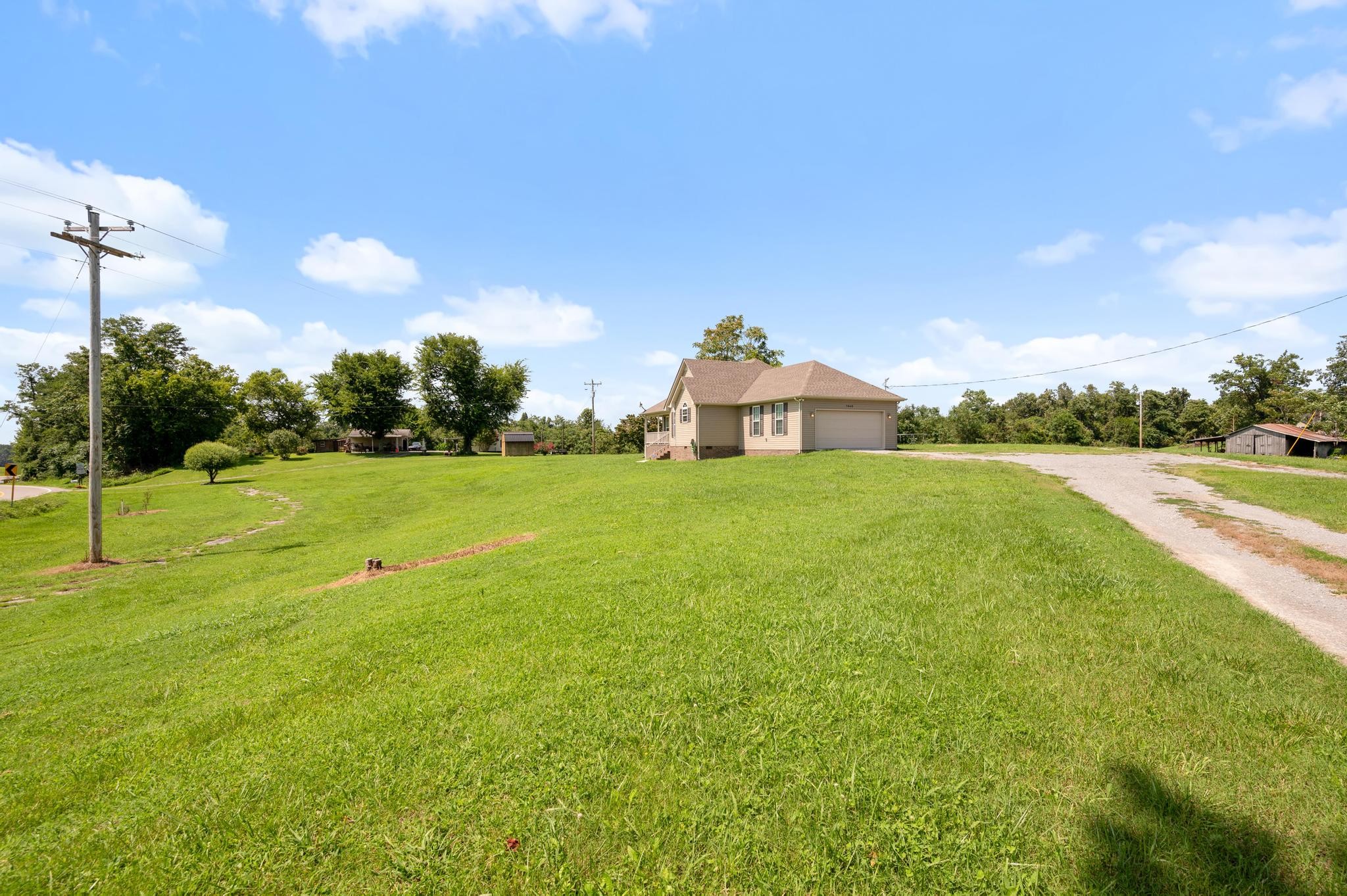 7040 Charity Road Petersburg, TN 37144 - Photo 25 of 36 a view of a house with a big yard
