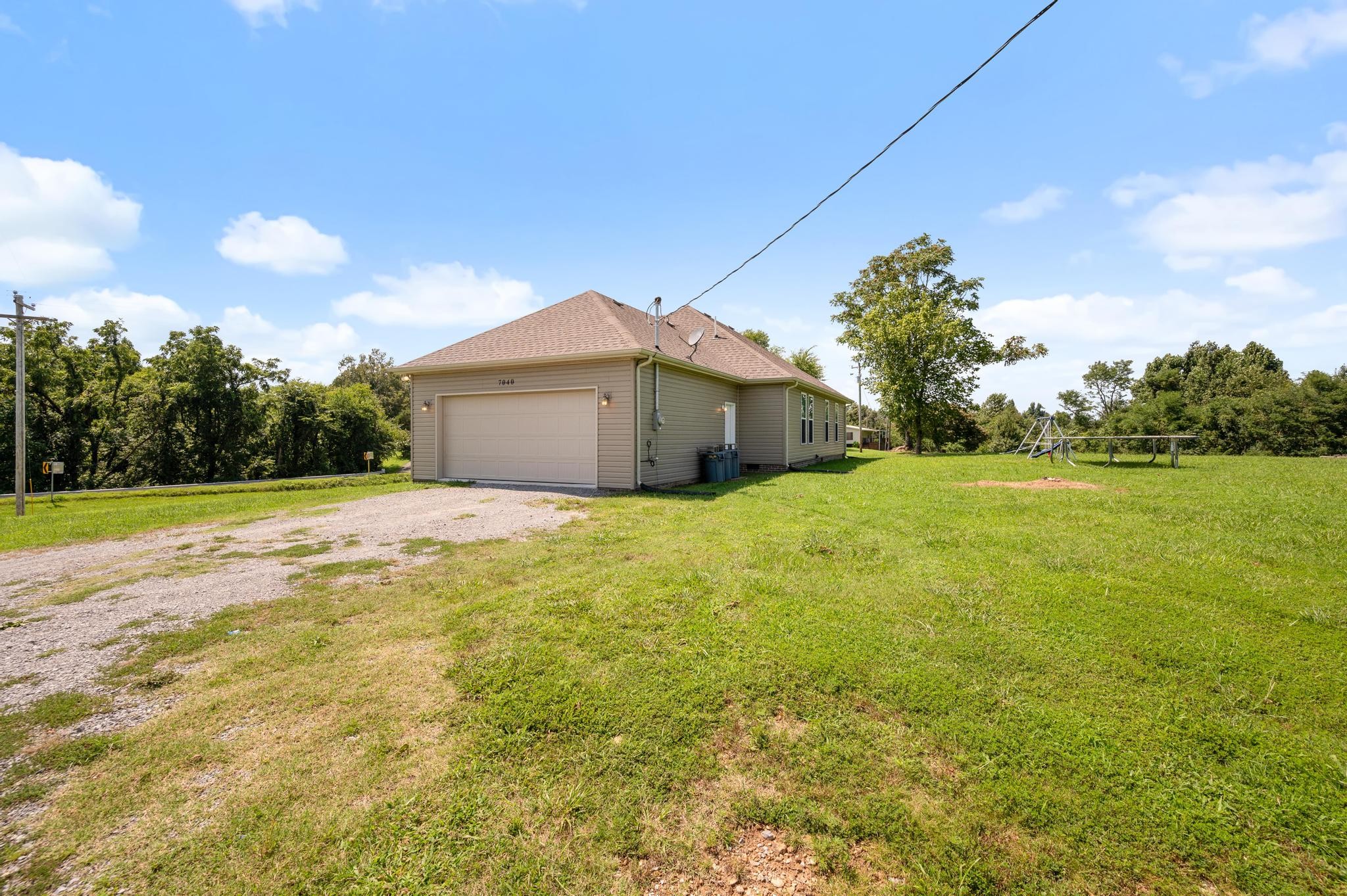 7040 Charity Road Petersburg, TN 37144 - Photo 28 of 36 a view of a house with a yard