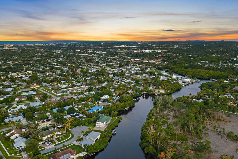 702 Warren Drive Jupiter, FL 33458 - Photo 75 of 76 a view of a lake with a city