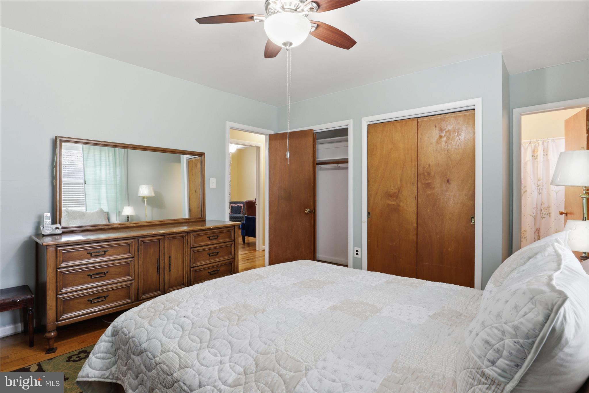 5811 Kirby Road Clinton, MD 20735 - Photo 17 of 43 a bedroom with a large bed and a dresser