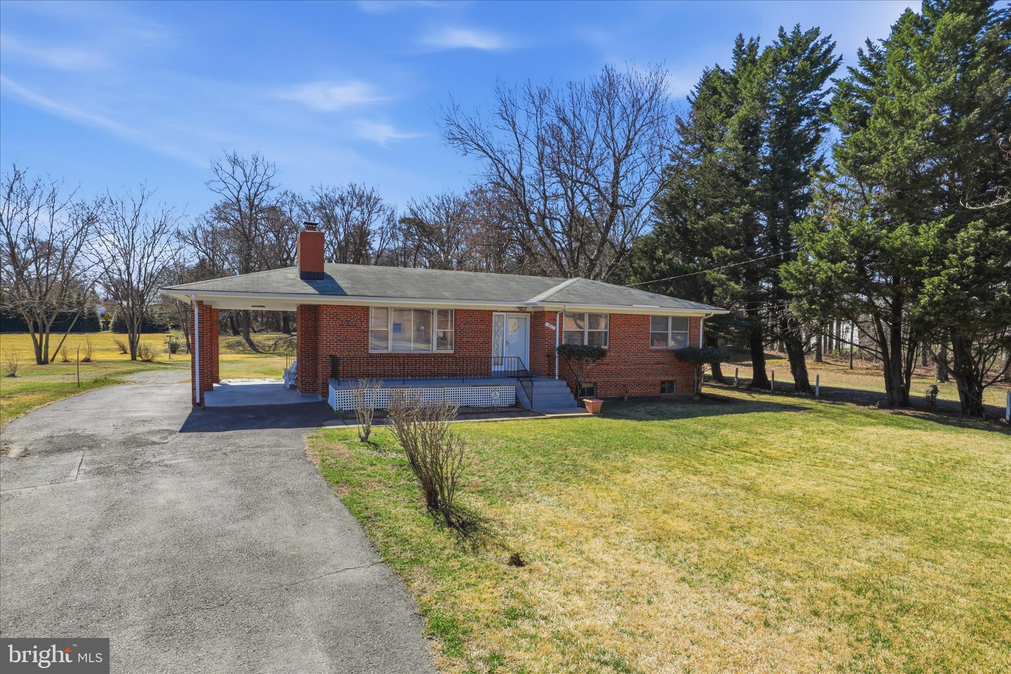5811 Kirby Road Clinton, MD 20735 - Photo 2 of 43 a view of a house with backyard and a tree
