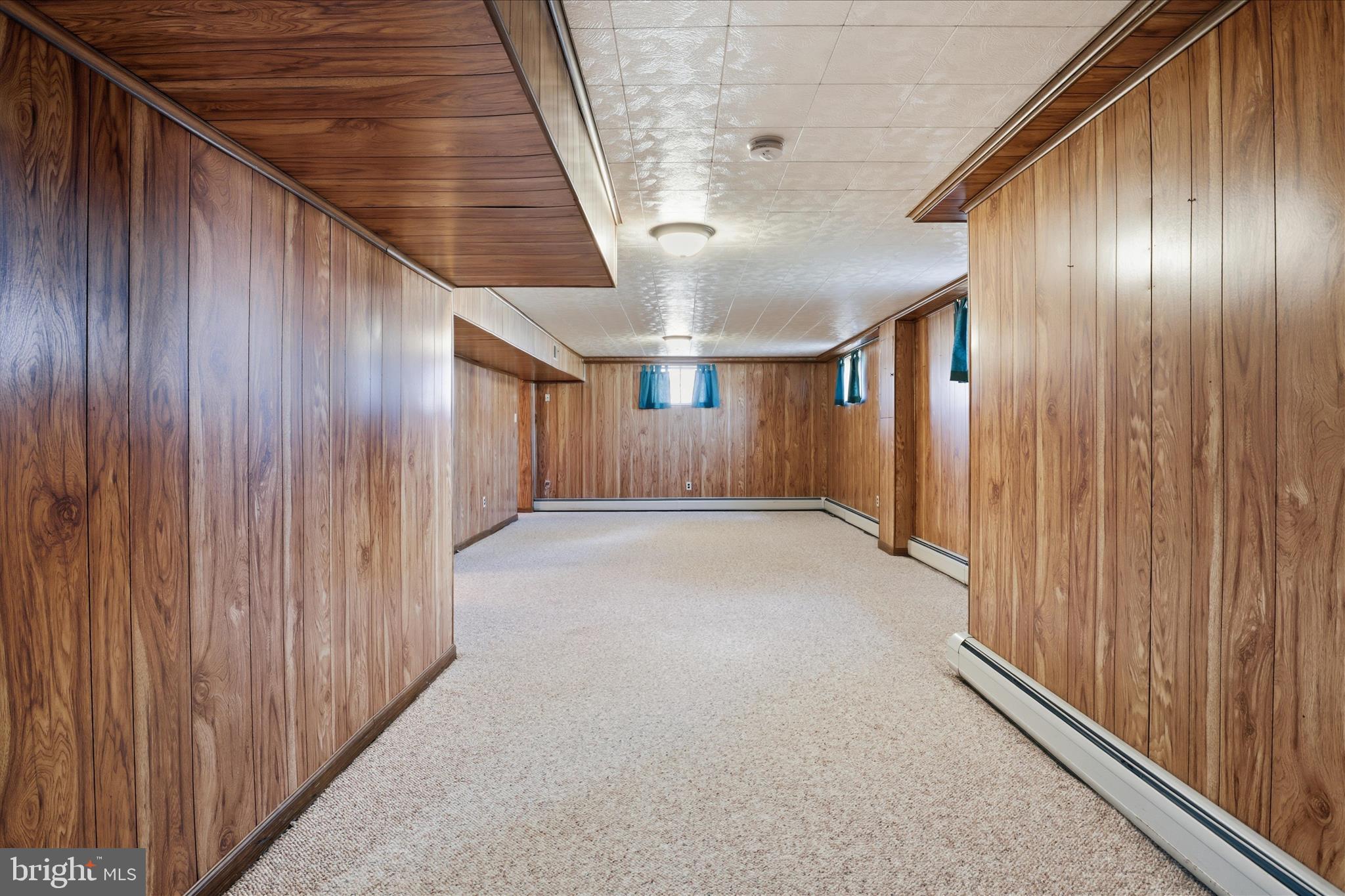 5811 Kirby Road Clinton, MD 20735 - Photo 25 of 43 a view of hallway with wooden floor