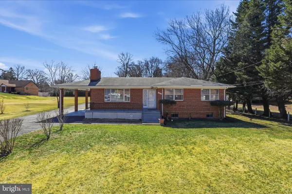 a view of a house with a swimming pool