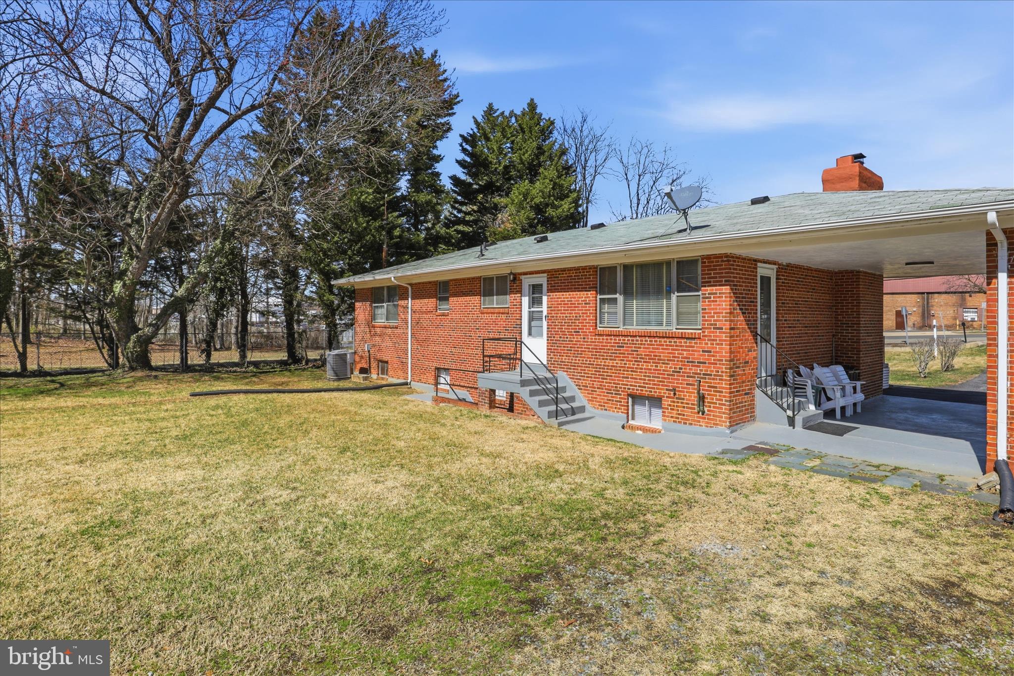 5811 Kirby Road Clinton, MD 20735 - Photo 33 of 43 a view of a house with backyard and sitting area