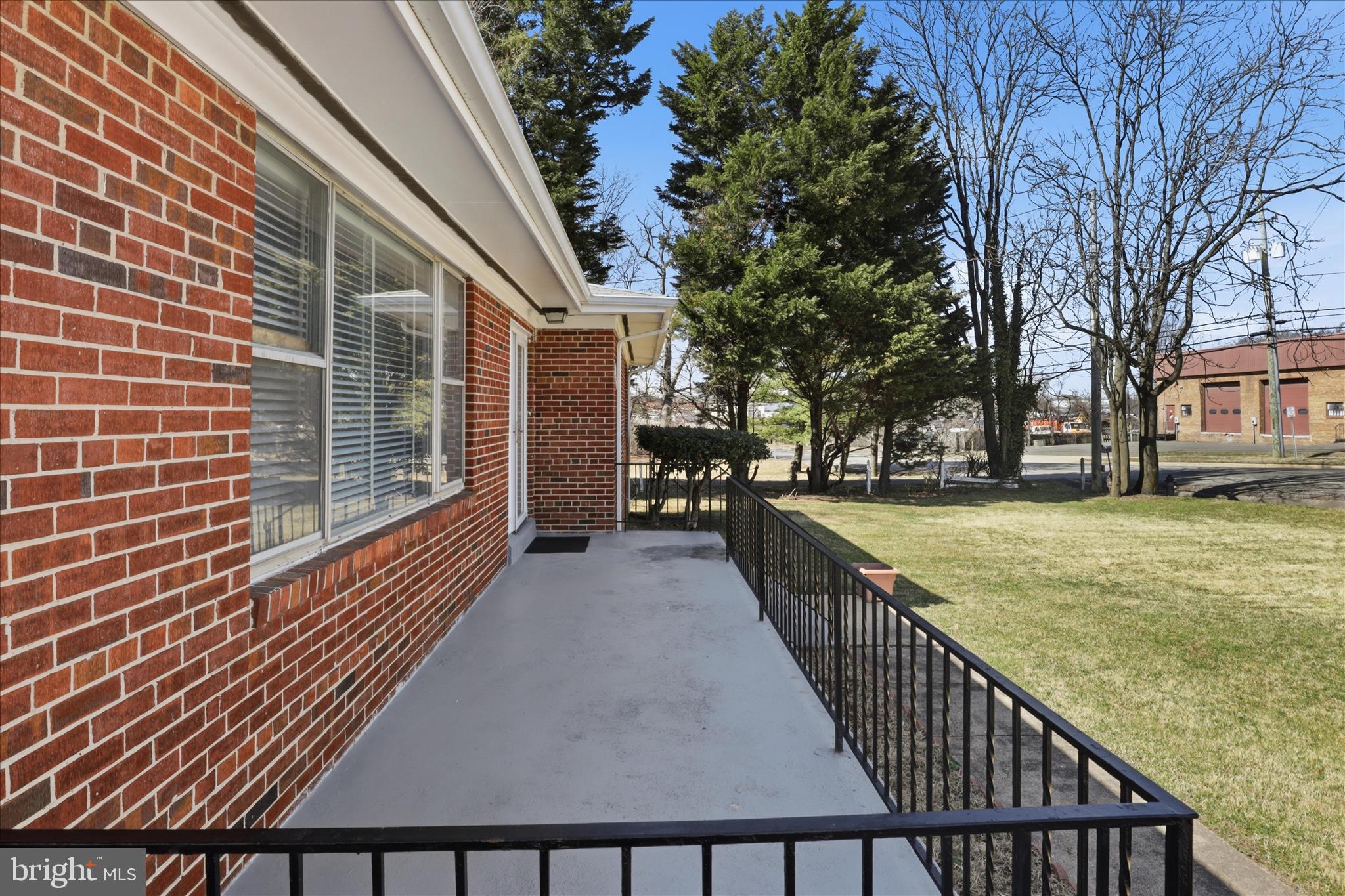5811 Kirby Road Clinton, MD 20735 - Photo 5 of 43 a view of a house with backyard and trees