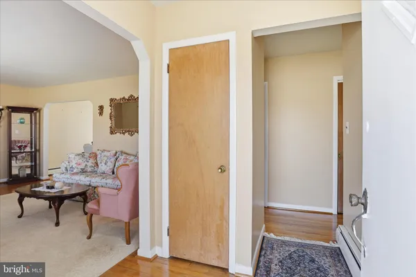 a living room with furniture and a gate
