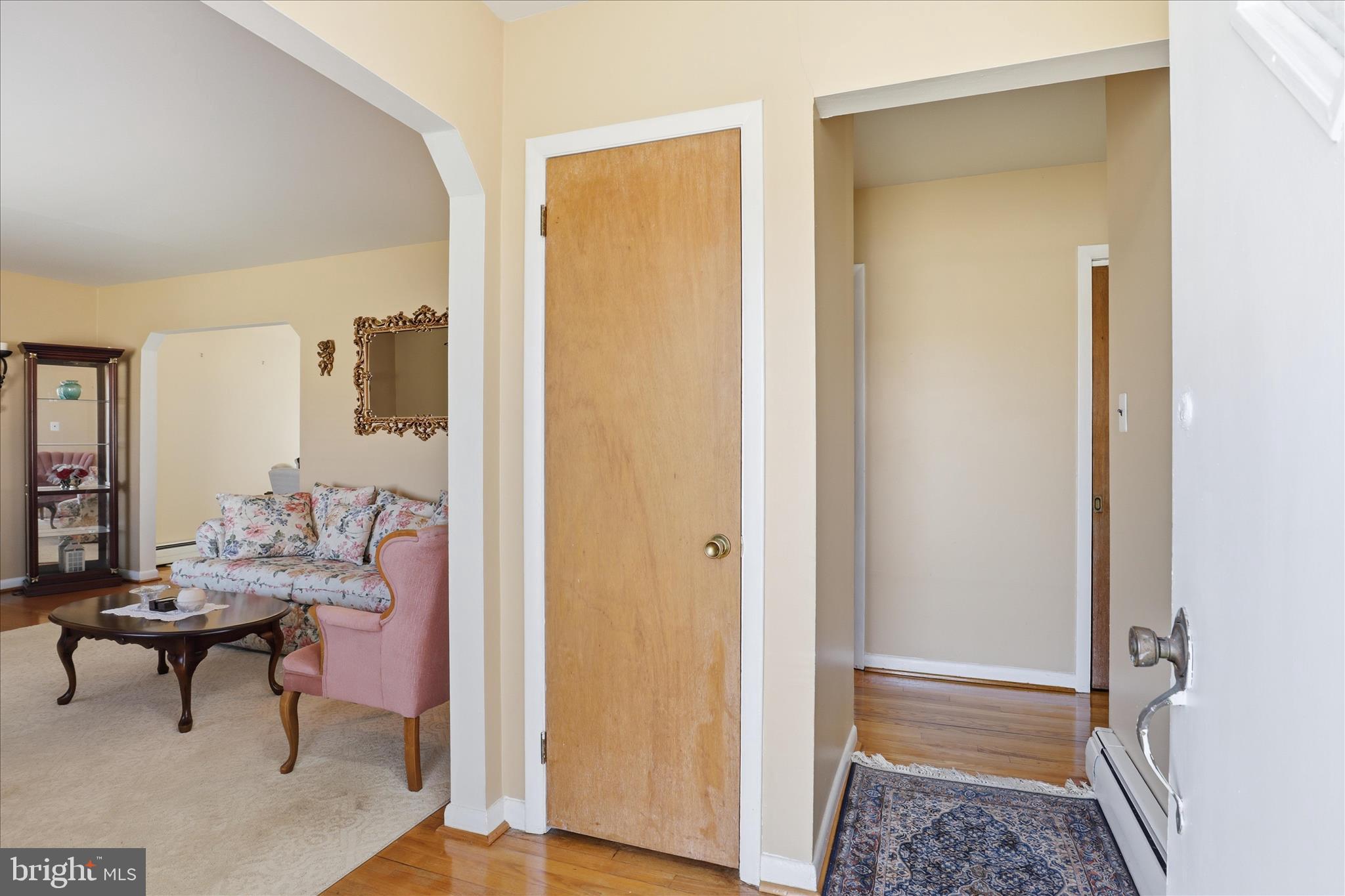 5811 Kirby Road Clinton, MD 20735 - Photo 6 of 43 a living room with furniture and a gate