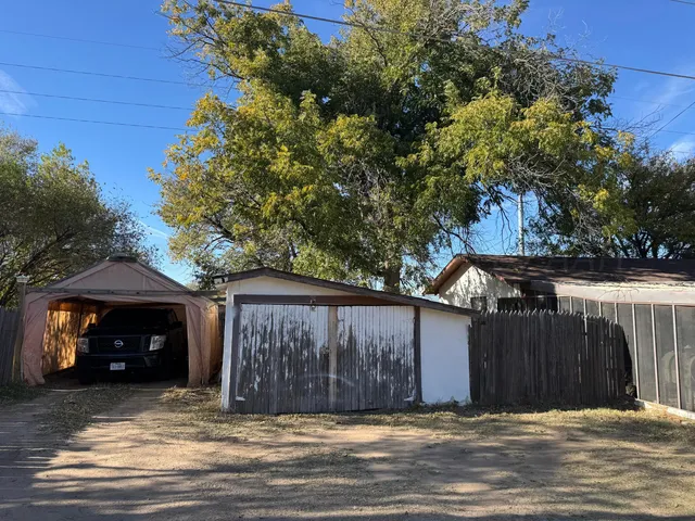 a view of a house with a garage