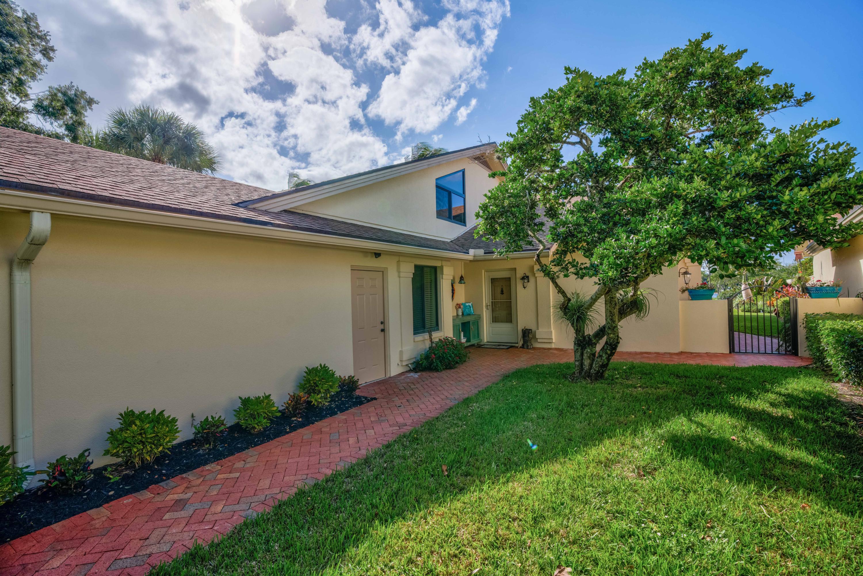 332 River Edge Road Jupiter, FL 33477 - Photo 30 of 103 SIde of the House
