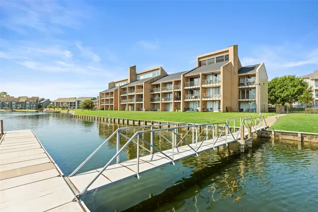 a view of a lake with a house