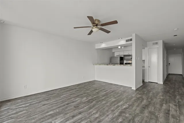 a view of a kitchen with a sink and dishwasher