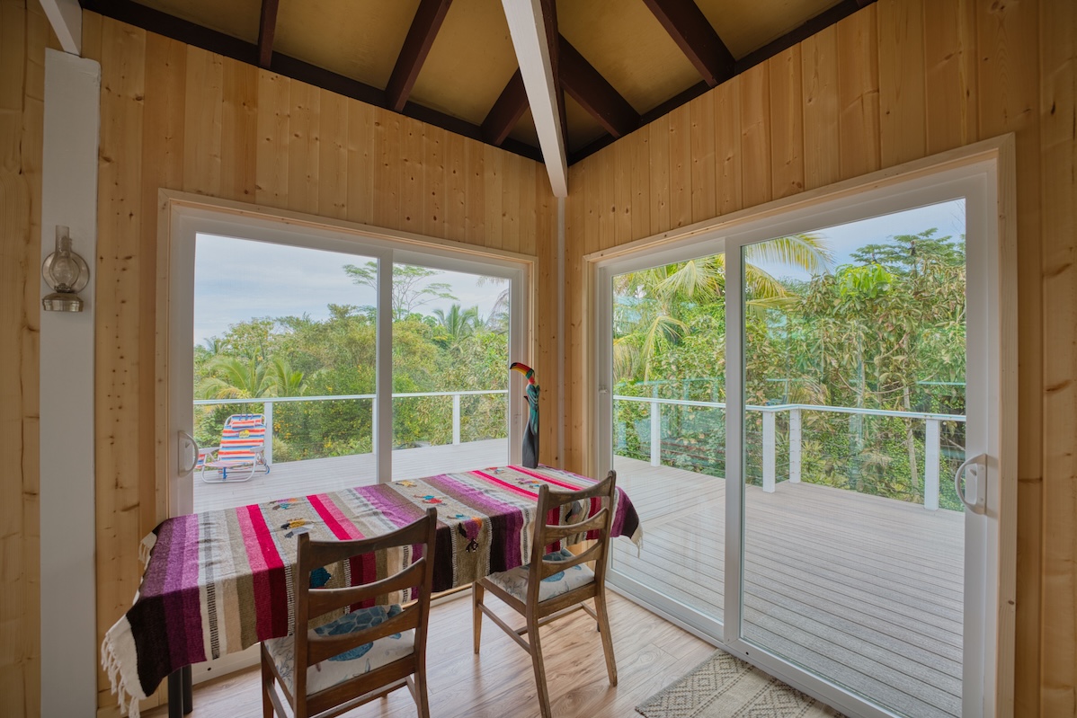 14-3674 Government Beach Road Pahoa, HI 96778 - Photo 11 of 29 a view of a dining room with furniture window and outside view