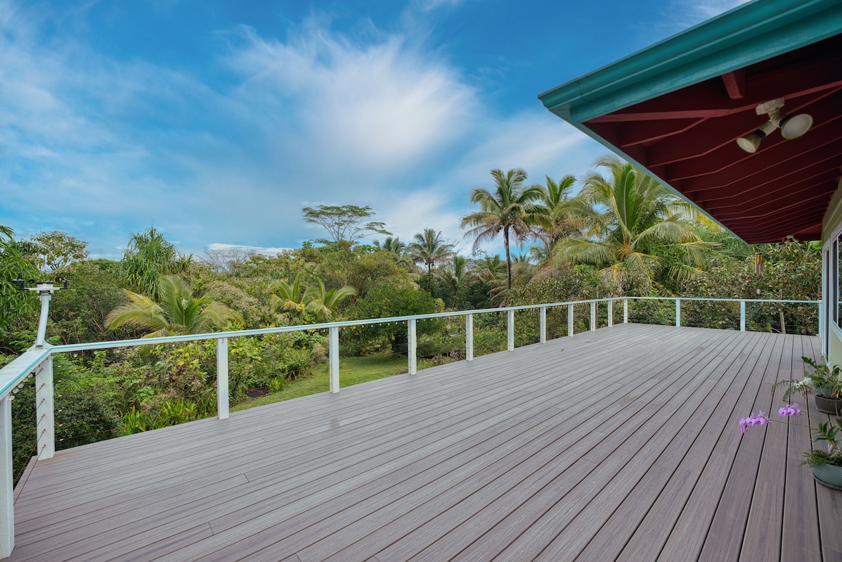 14-3674 Government Beach Road Pahoa, HI 96778 - Photo 14 of 29 a view of a roof deck with wooden floor and fence