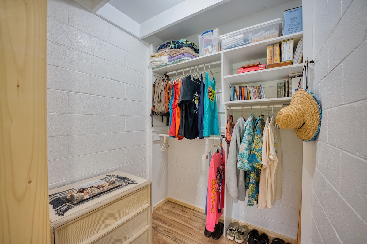14-3674 Government Beach Road Pahoa, HI 96778 - Photo 17 of 29 a store room with lots of different colored cloths