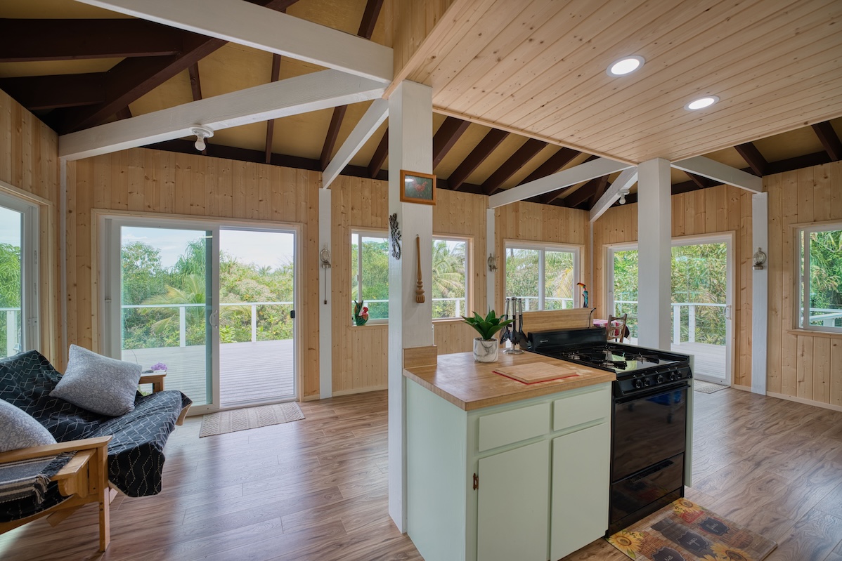 14-3674 Government Beach Road Pahoa, HI 96778 - Photo 10 of 29 a view of a livingroom with furniture and floor to ceiling window