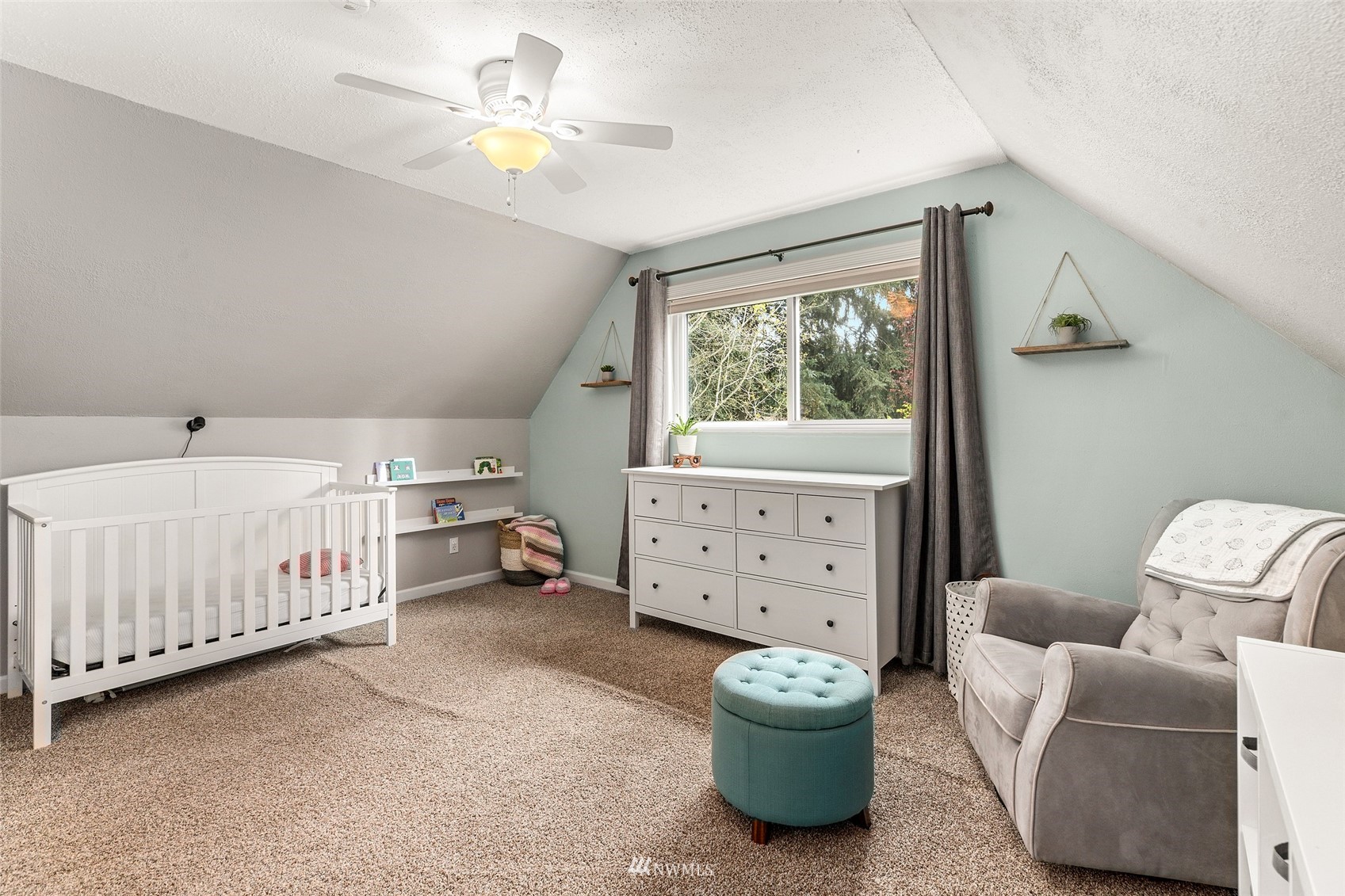 14627 Southeast 140th Street Renton, WA 98059 - Photo 22 of 33 a bedroom with furniture and a window