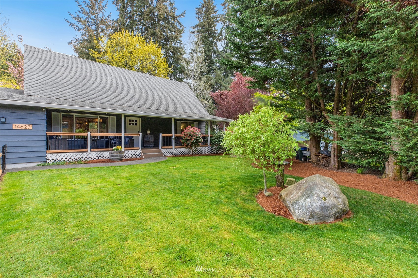 14627 Southeast 140th Street Renton, WA 98059 - Photo 3 of 33 a view of a house with backyard and garden