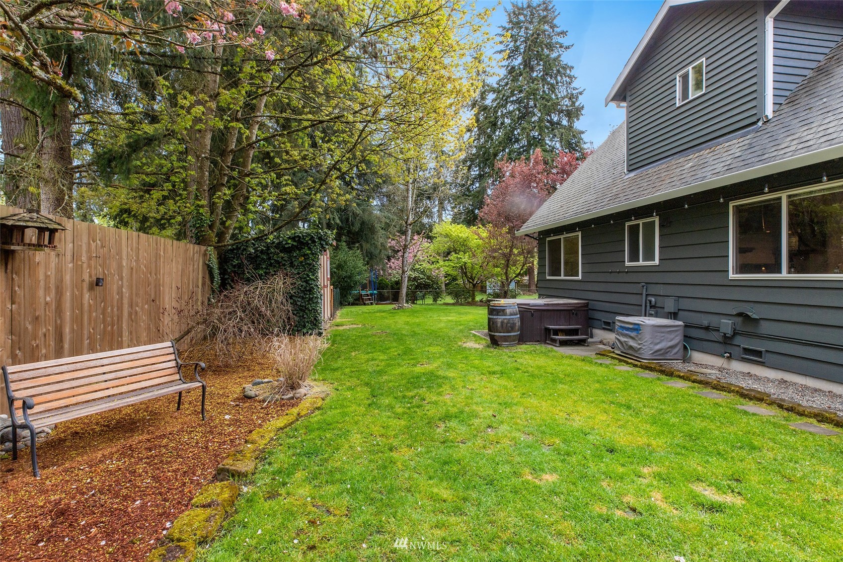 14627 Southeast 140th Street Renton, WA 98059 - Photo 32 of 33 a backyard of a house with seating space