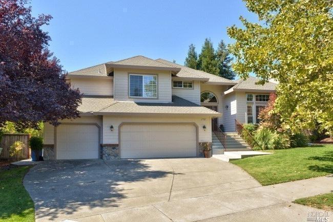1503 San Ramon Way Santa Rosa, CA 95409 - Photo 1 of 1 a front view of a house with a yard and trees