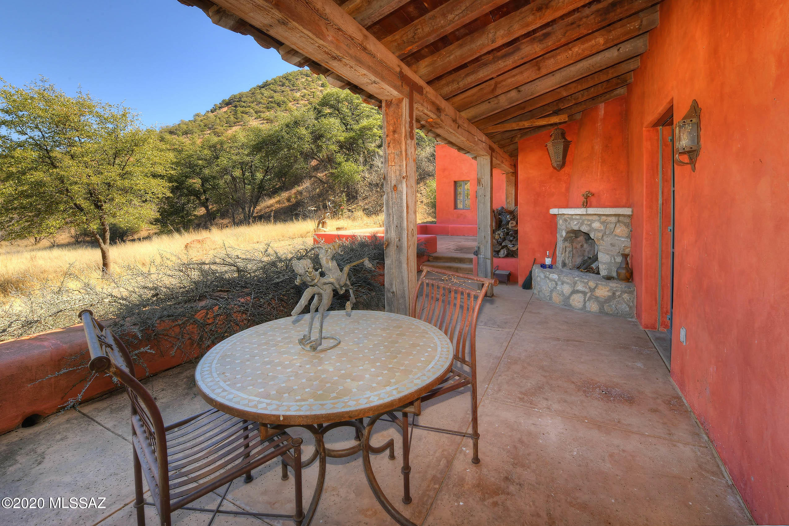 360 Harshaw Creek Road Patagonia, AZ 85624 - Photo 37 of 50 a view of balcony with table and chairs