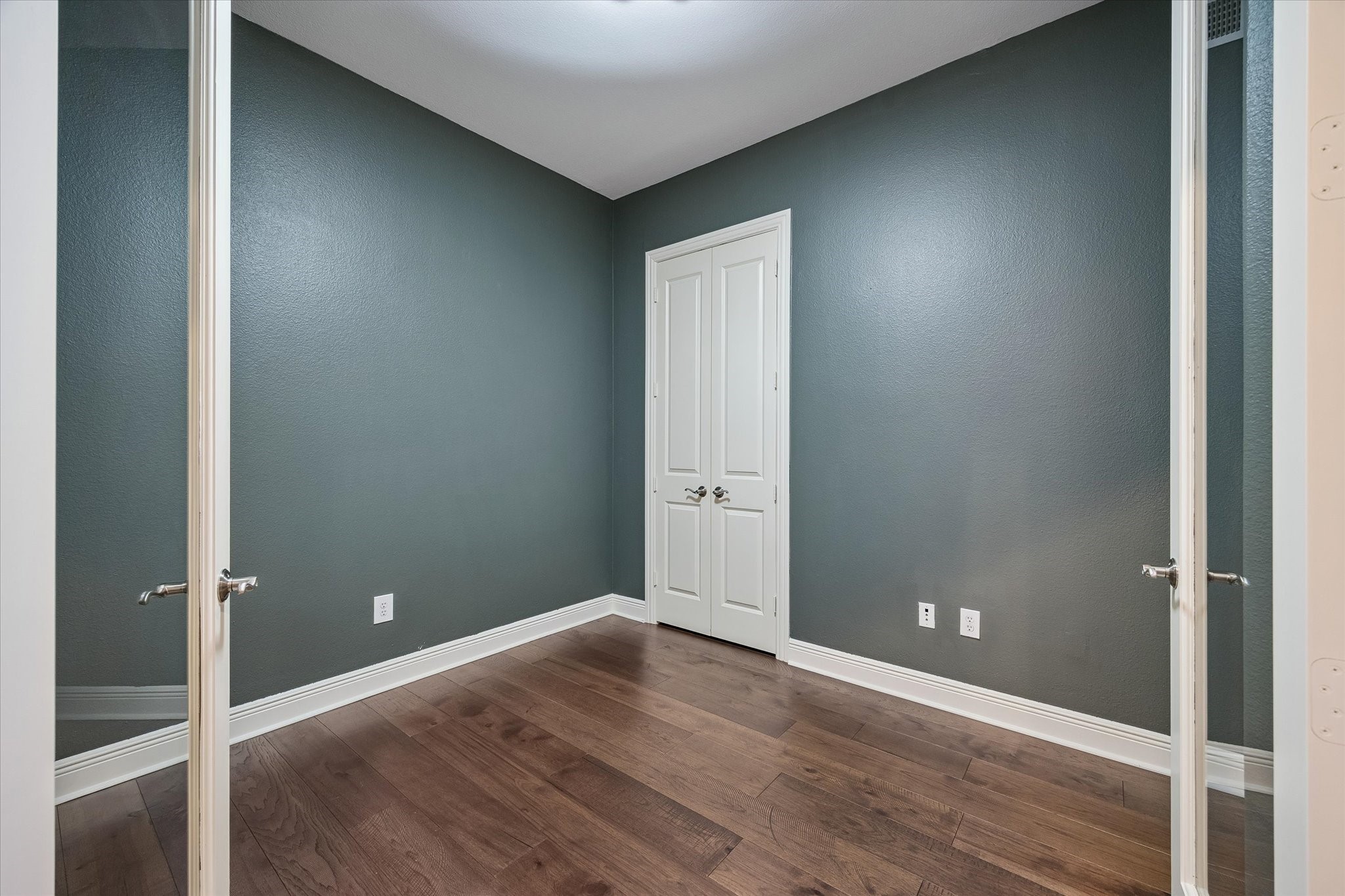 2120 Kipling Street, Unit 304 Houston, TX 77098 - Photo 19 of 24 Behind double doors, the private study offers a quiet and versatile work-from-home space designed for today’s lifestyle. Whether used as a home office, reading room, or flex space, it adds both functionality and flexibility to the home.