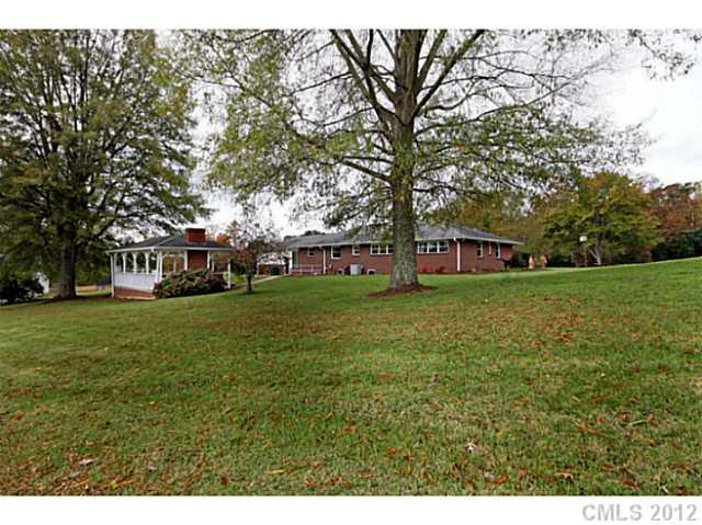 235 Thacker Road Rural Hall, NC 27045 - Photo 4 of 16 a view of a house with a big yard