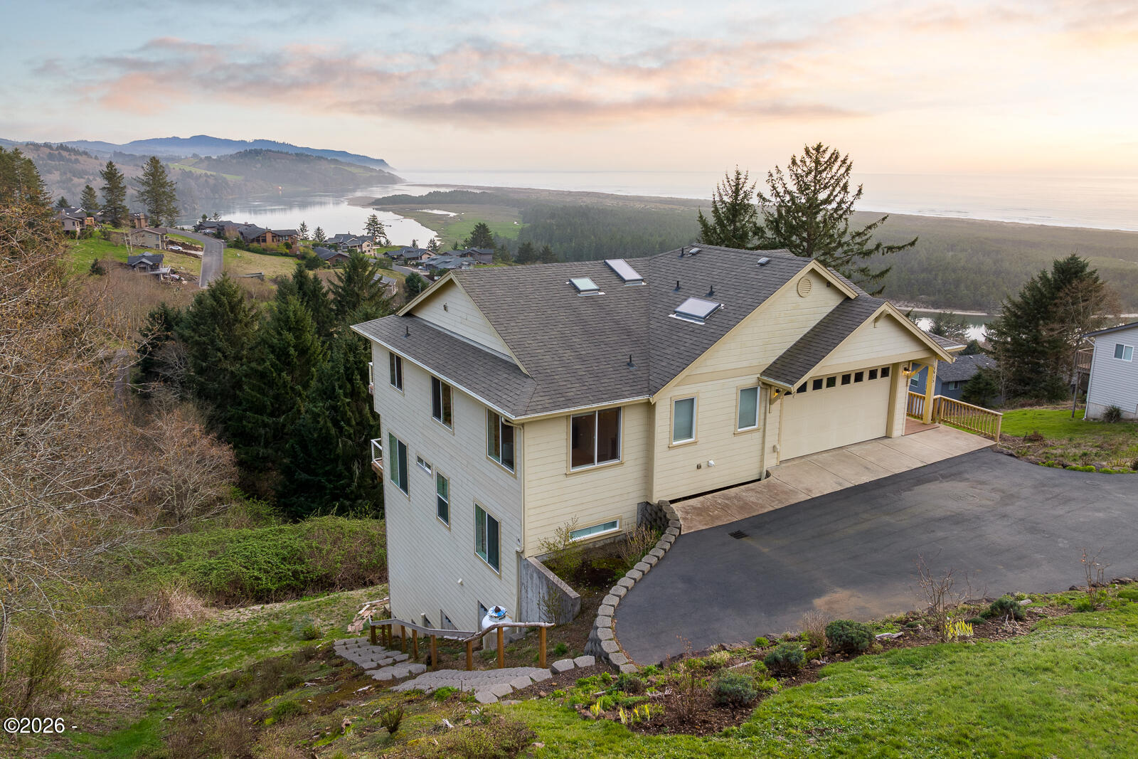 7415 East Summit Road Pacific City, OR 97135 - Photo 3 of 44 an aerial view of a house with a big yard