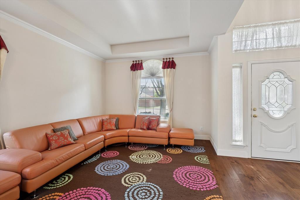 610 Spring Hill Drive Coppell, TX 75019 - Photo 5 of 15 a living room with furniture and a couch