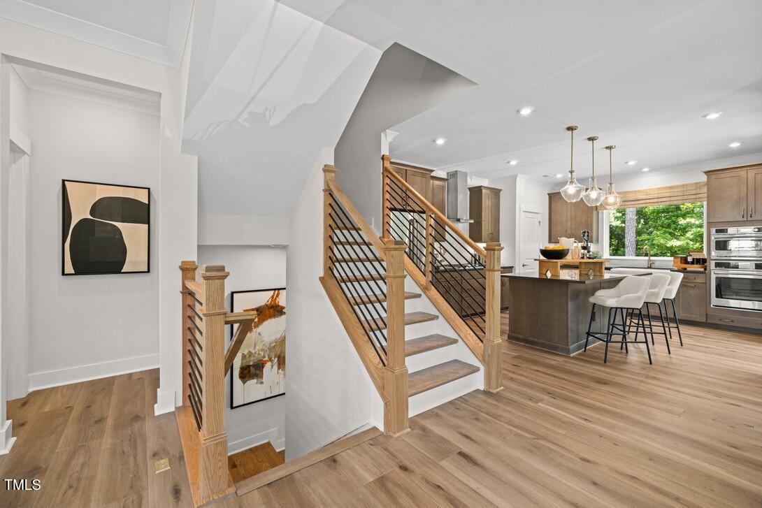 4734 Cypress Tree Lane Raleigh, NC 27612 - Photo 34 of 37 Elm Park 48_Stairwell 1_6.24.24_webready