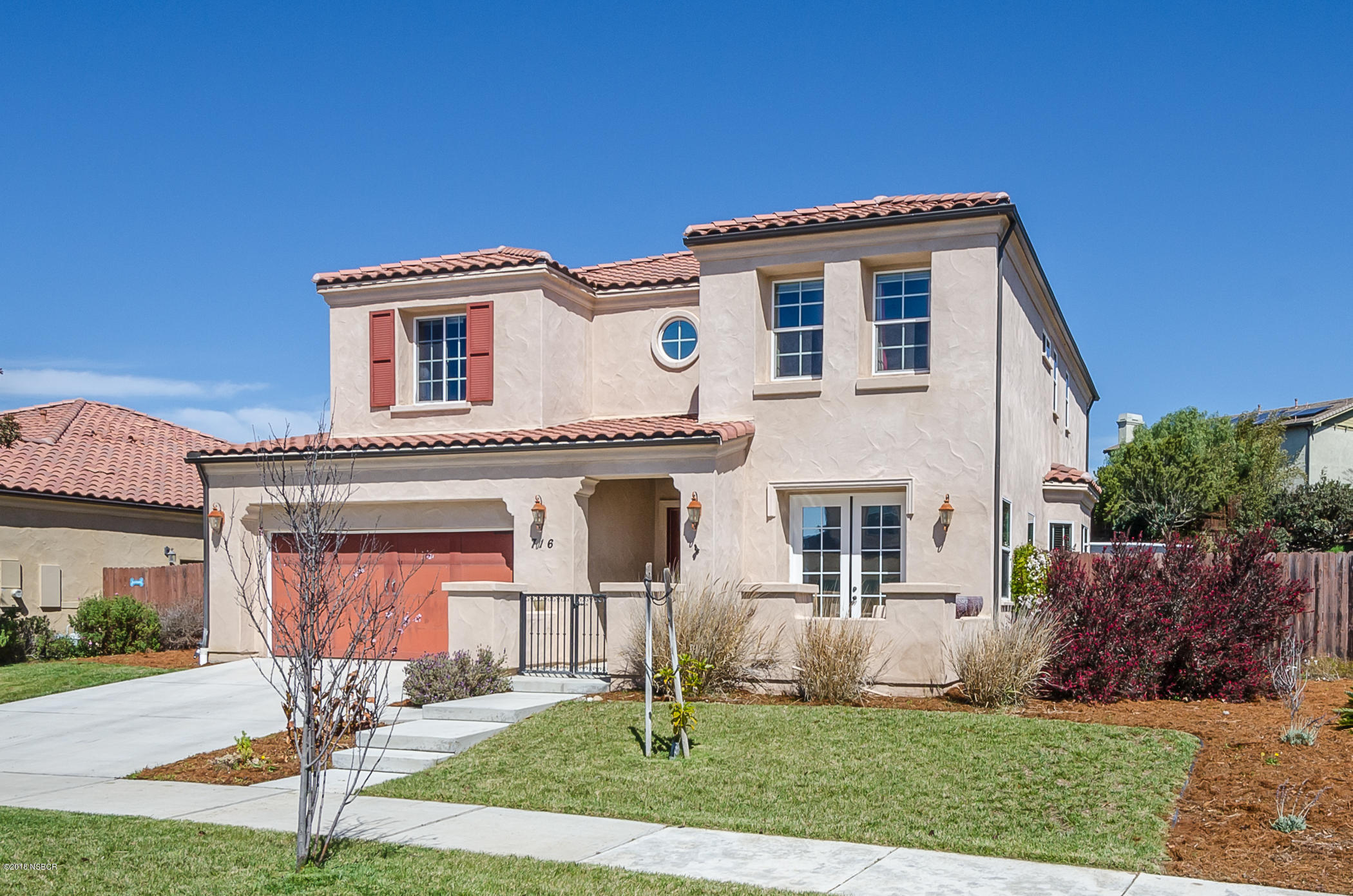 716 Enterprise Avenue Lompoc, CA 93436 - Photo 2 of 43 a front view of a house with a yard