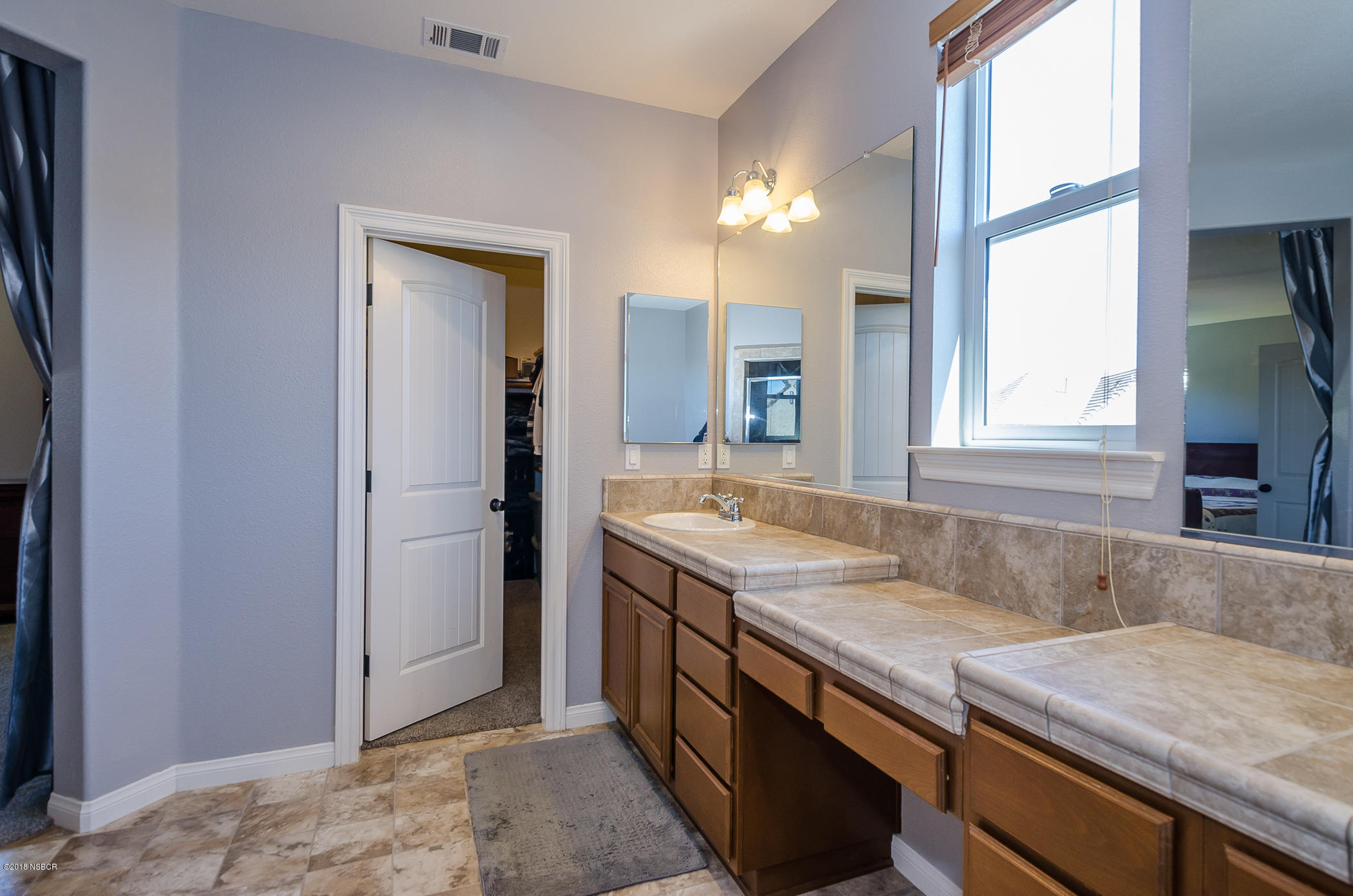 716 Enterprise Avenue Lompoc, CA 93436 - Photo 24 of 43 a view of a kitchen cabinets and a sink