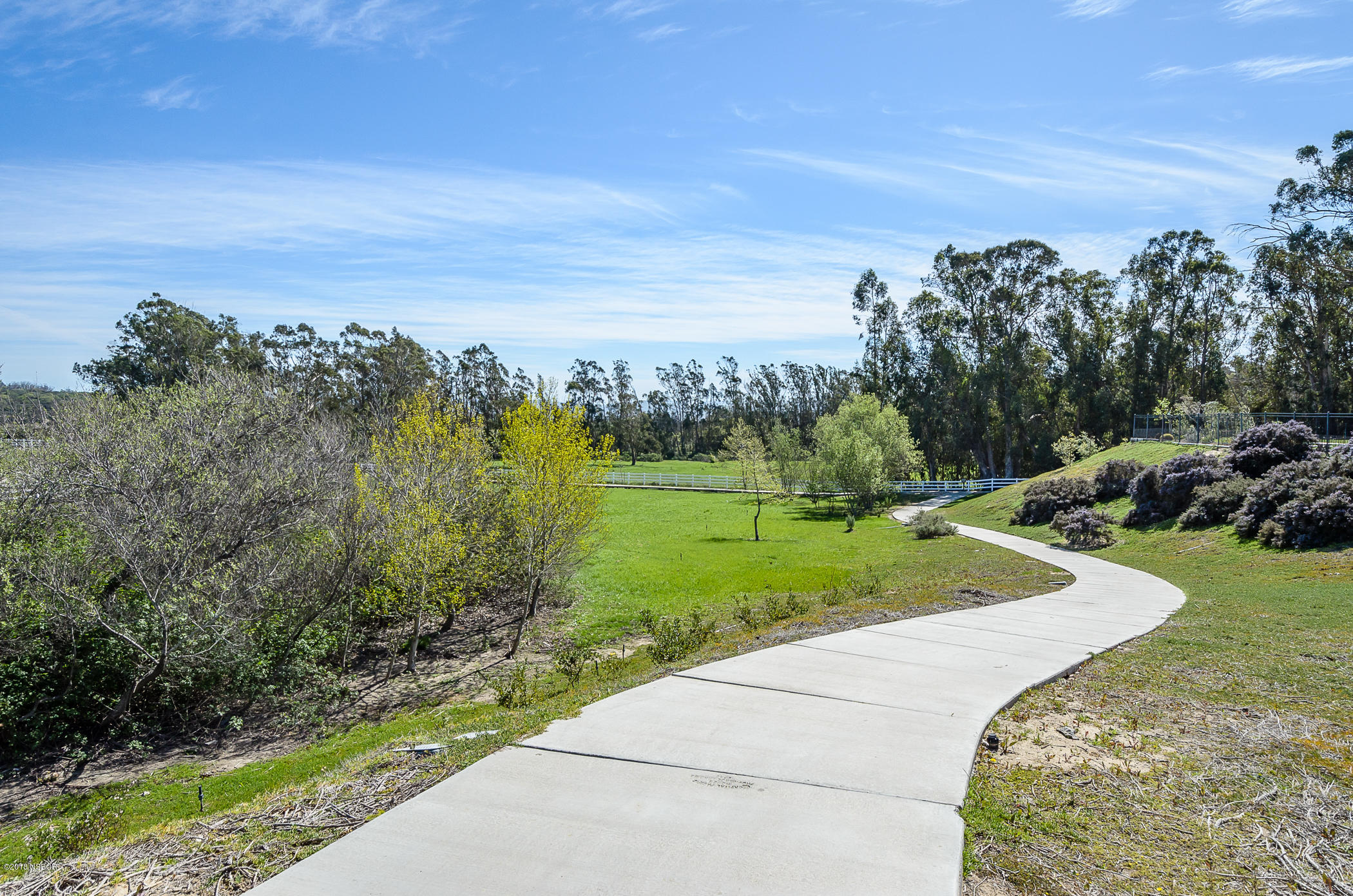 716 Enterprise Avenue Lompoc, CA 93436 - Photo 42 of 43 a view of a pathway both side of grassy field with shrub