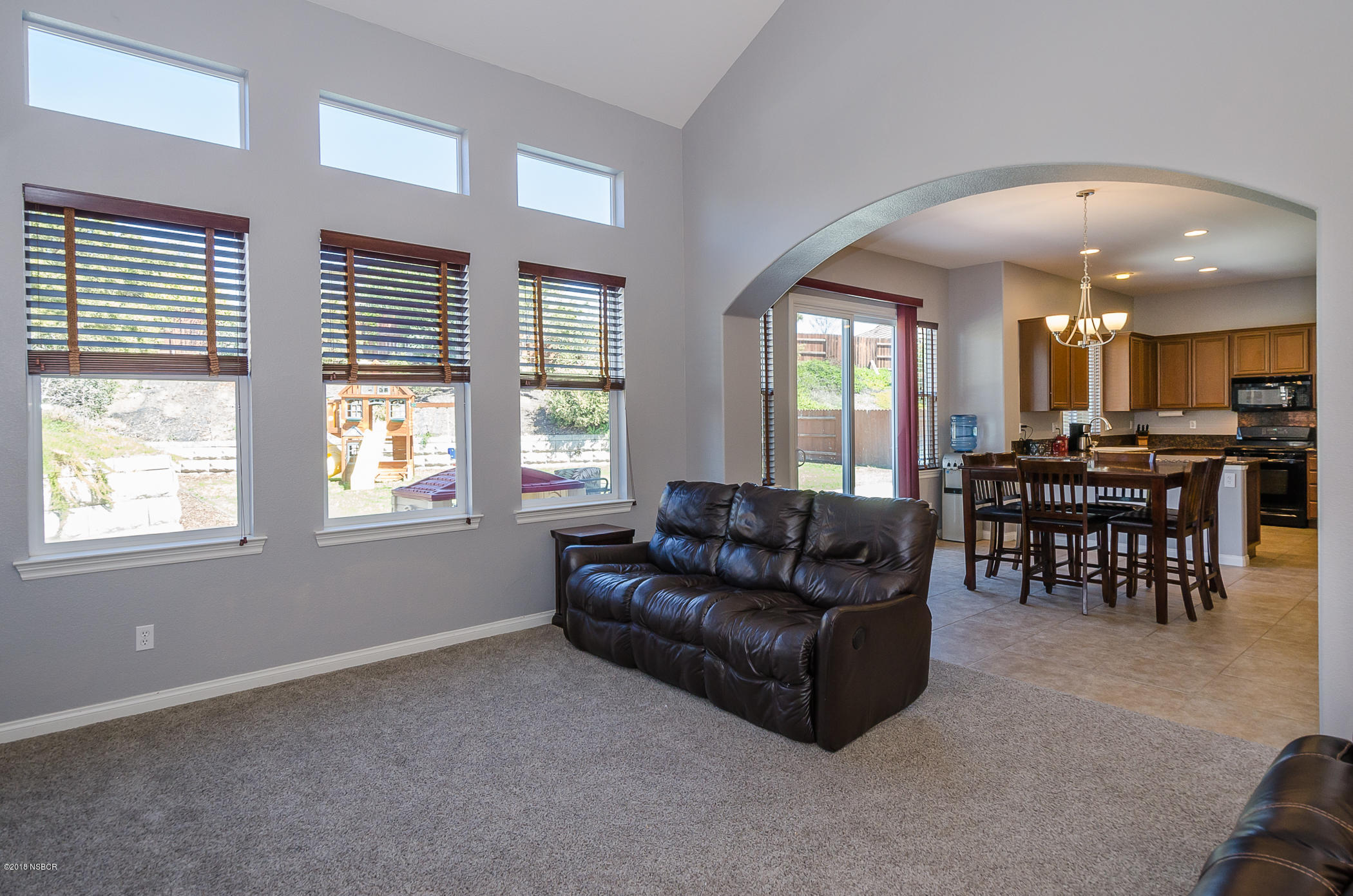 716 Enterprise Avenue Lompoc, CA 93436 - Photo 9 of 43 a living room with furniture and a large window