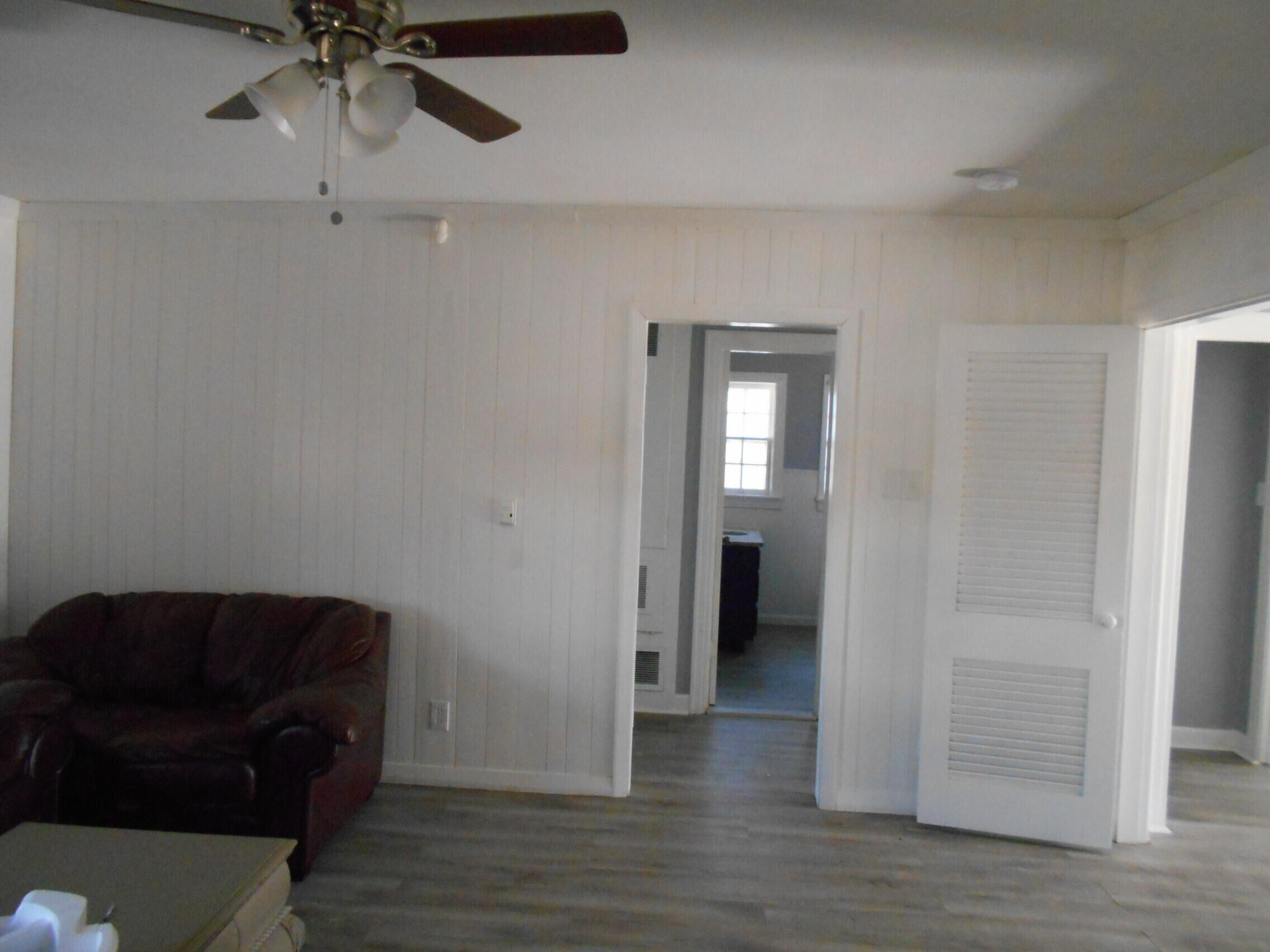 2614 31st Street Lubbock, TX 79410 - Photo 6 of 15 a living room with furniture and a window
