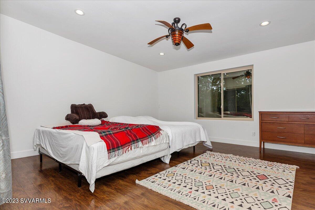 143 East Walker Road Camp Verde, AZ 86322 - Photo 16 of 42 a bedroom with a bed and a dresser