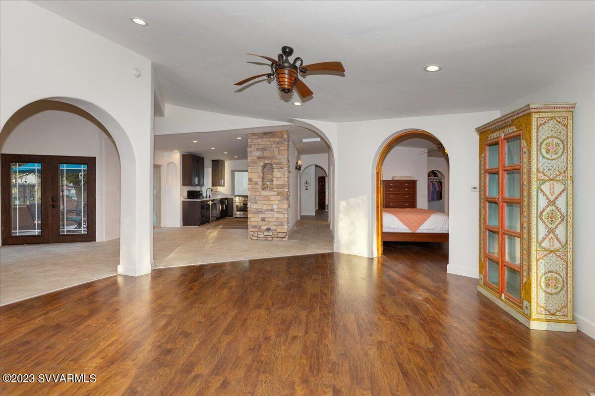 143 East Walker Road Camp Verde, AZ 86322 - Photo 7 of 42 a view of living room filled with furniture and wooden floor