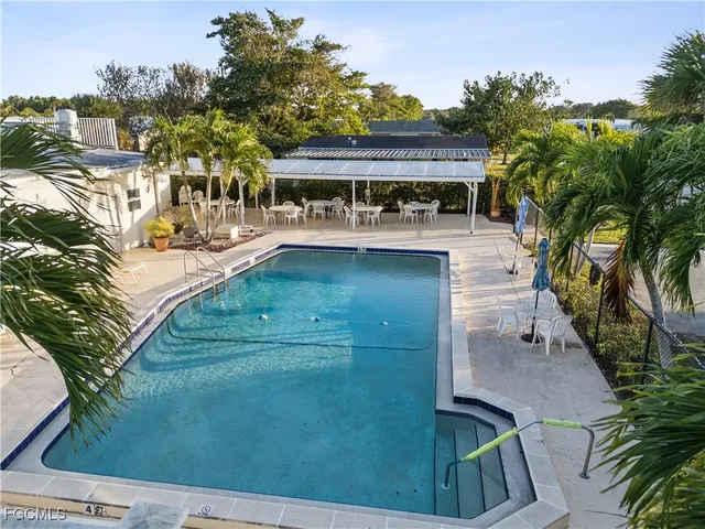 a view of a house with swimming pool