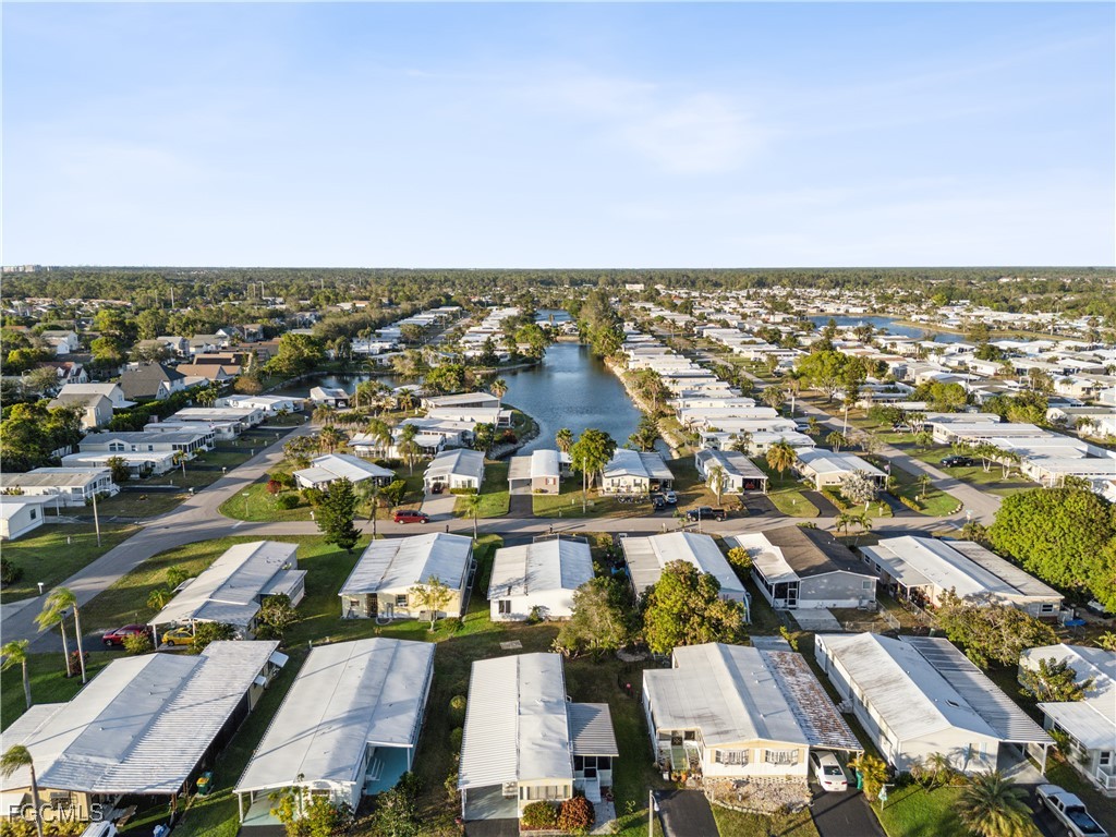 455 Cape Florida Way Naples, FL 34104 - Photo 9 of 35 an aerial view of a city with lots of residential buildings
