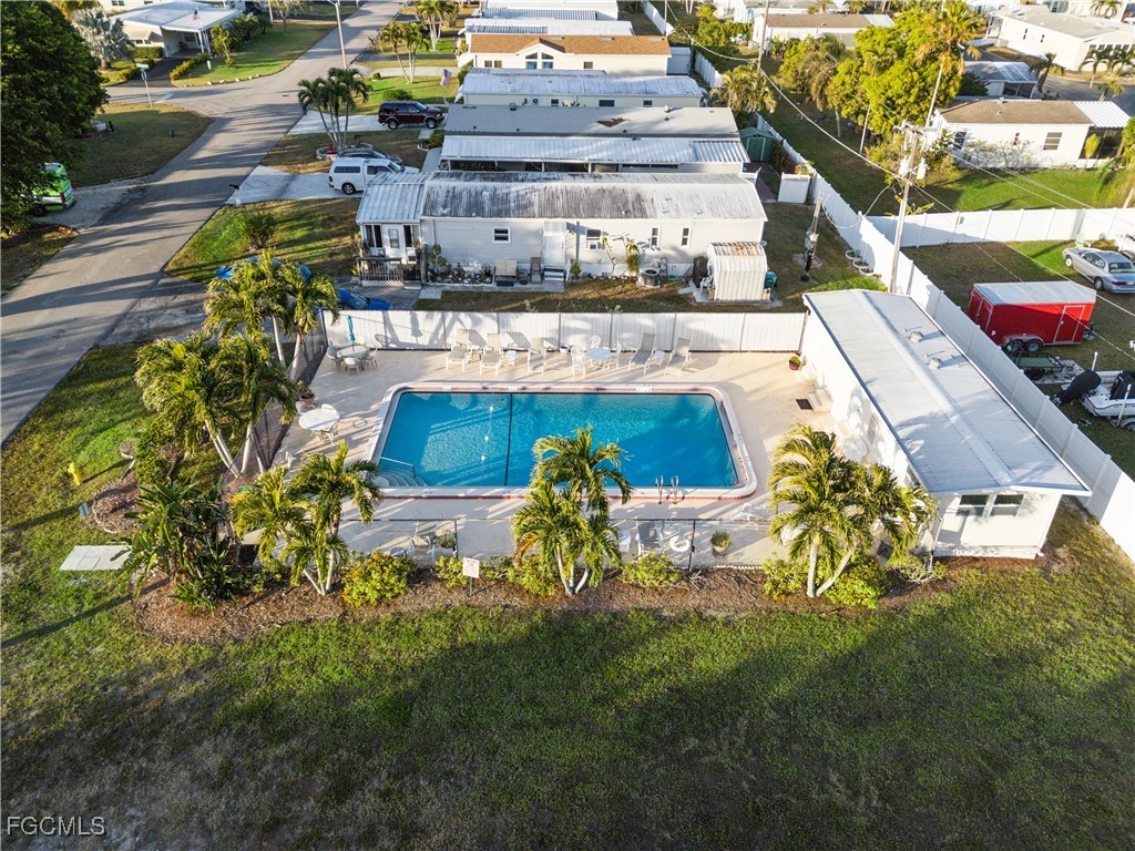 455 Cape Florida Way Naples, FL 34104 - Photo 10 of 35 a view of swimming pool with a patio