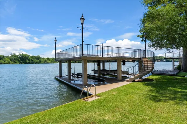 a view of a swimming pool with a table and chairs