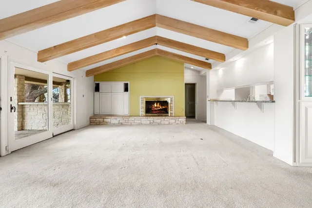 a view of a livingroom with a fireplace