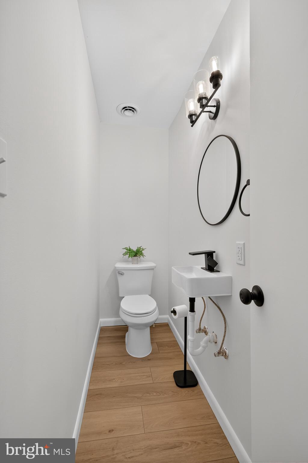119 Oaks Road Oxford, PA 19363 - Photo 20 of 58 a bathroom with a toilet and a sink