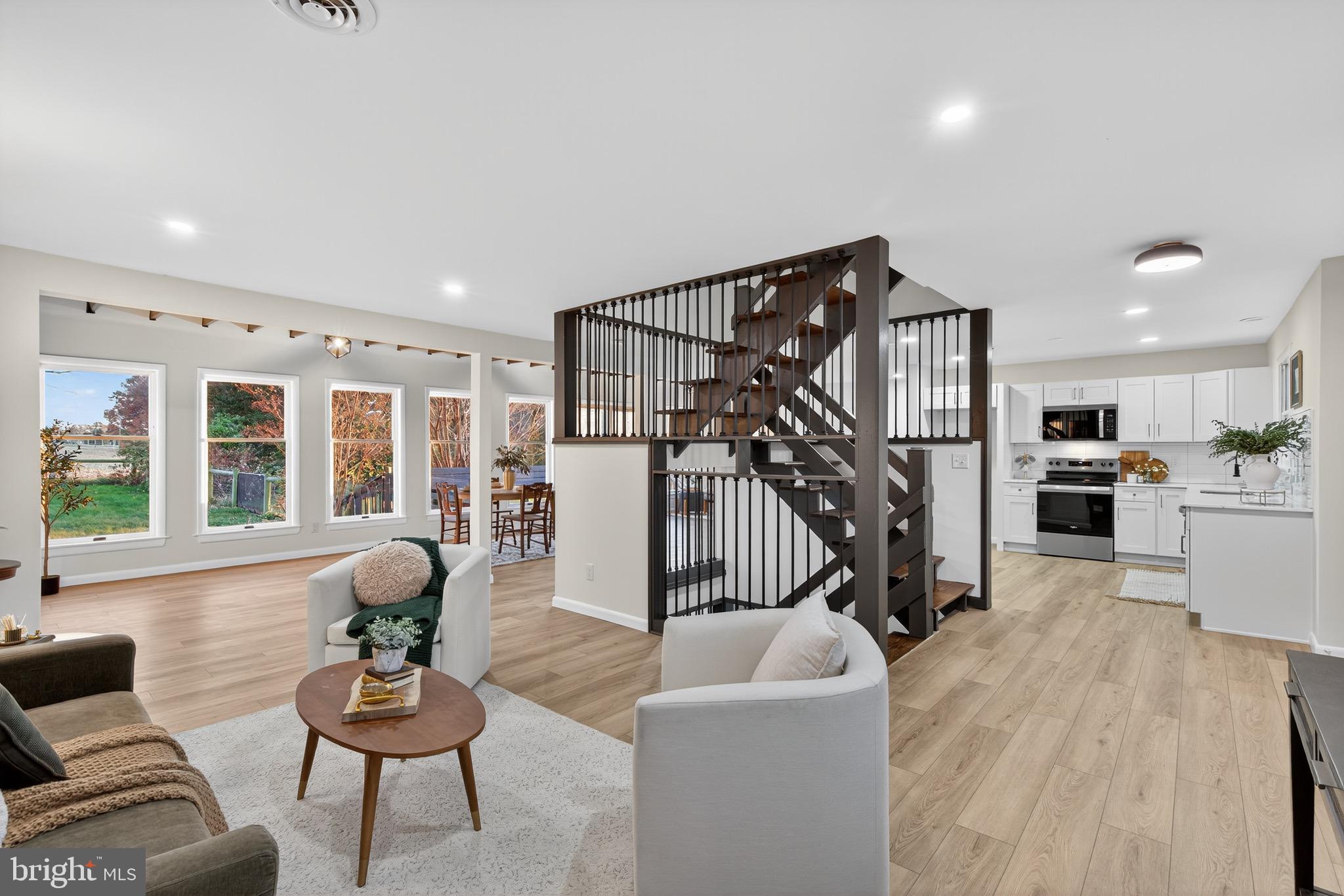 119 Oaks Road Oxford, PA 19363 - Photo 2 of 58 a living room with furniture or kitchen and a wooden floor