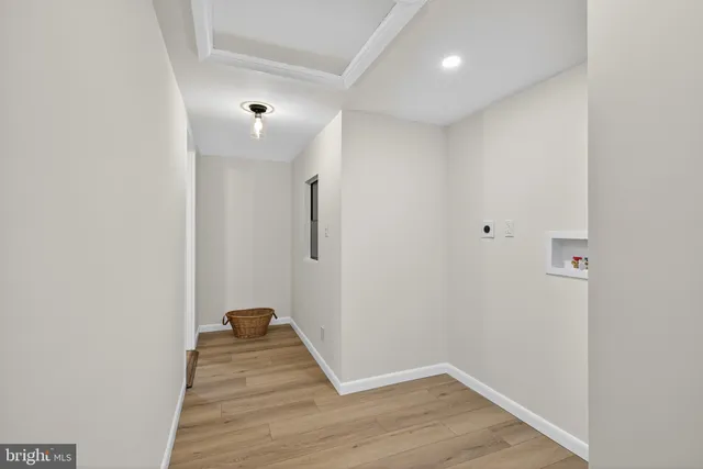 a bedroom with a bed and lamp