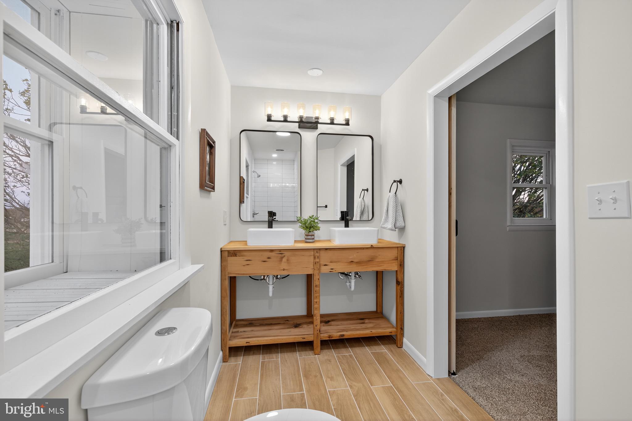 119 Oaks Road Oxford, PA 19363 - Photo 29 of 58 a bathroom with a tub sink and mirror
