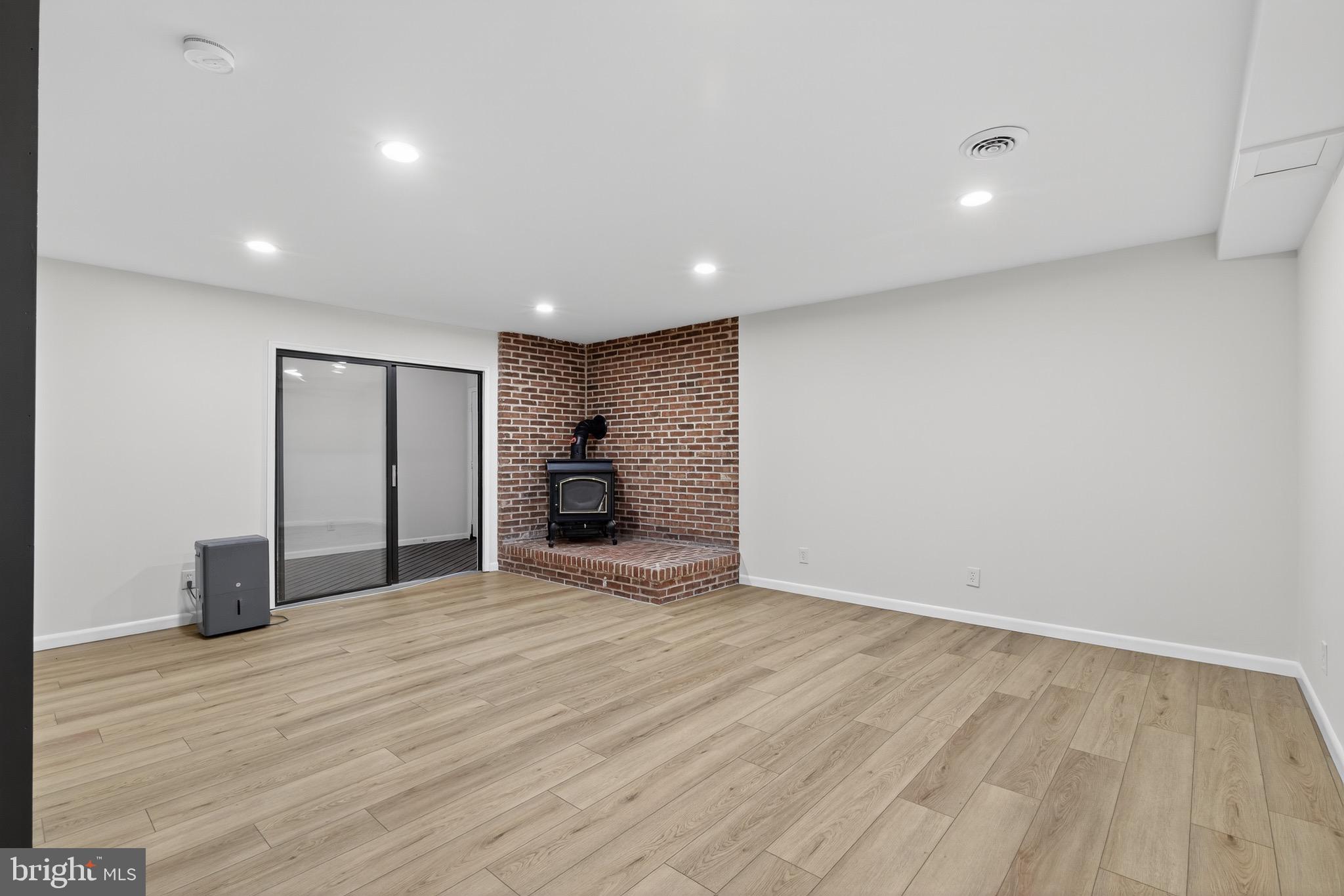 119 Oaks Road Oxford, PA 19363 - Photo 39 of 58 a view of empty room with wooden floor