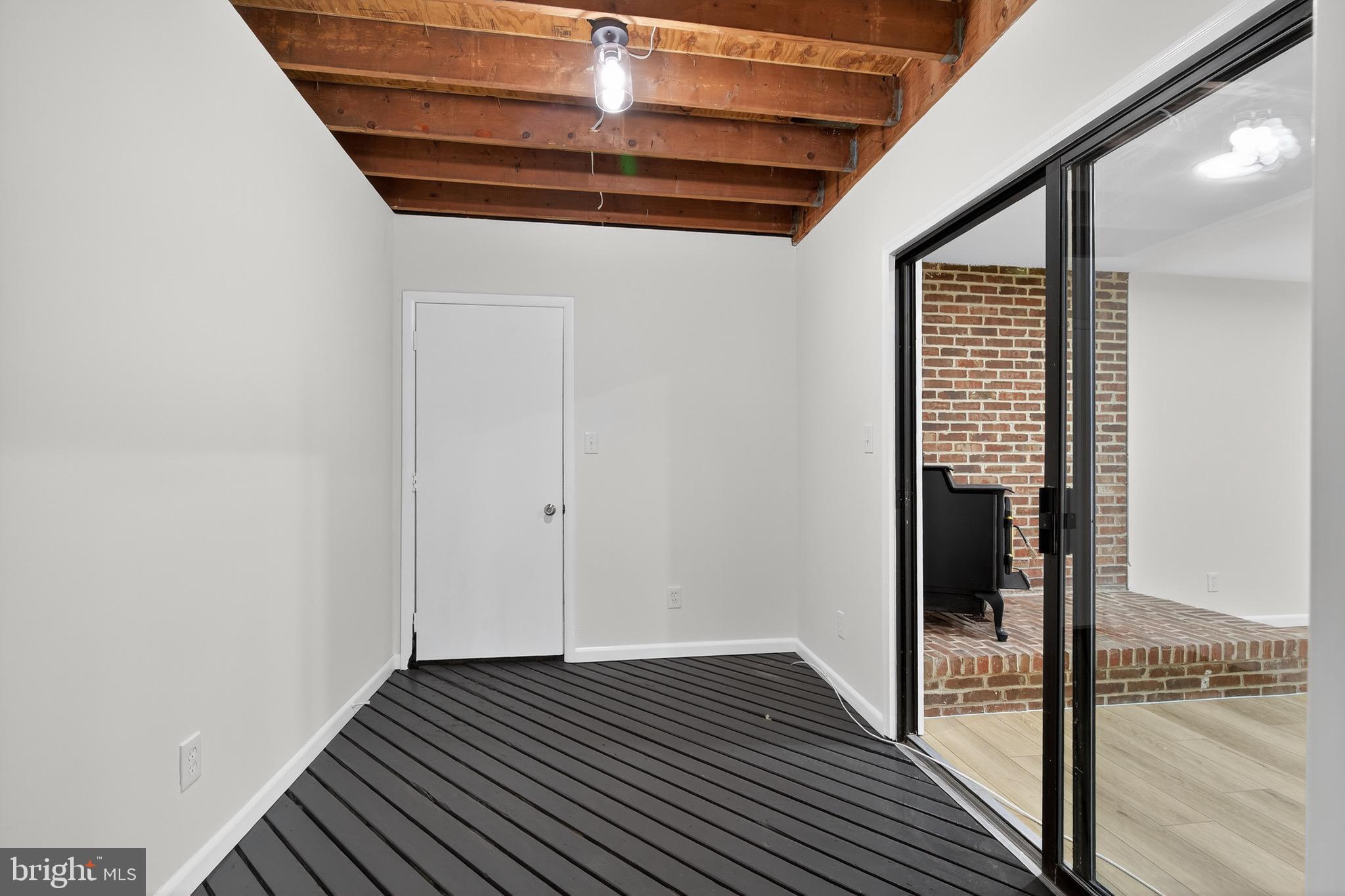 119 Oaks Road Oxford, PA 19363 - Photo 45 of 58 a view of a hallway with wooden floor and staircase